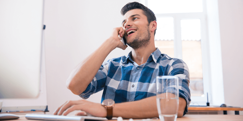 Young man following up his interview with a phone call