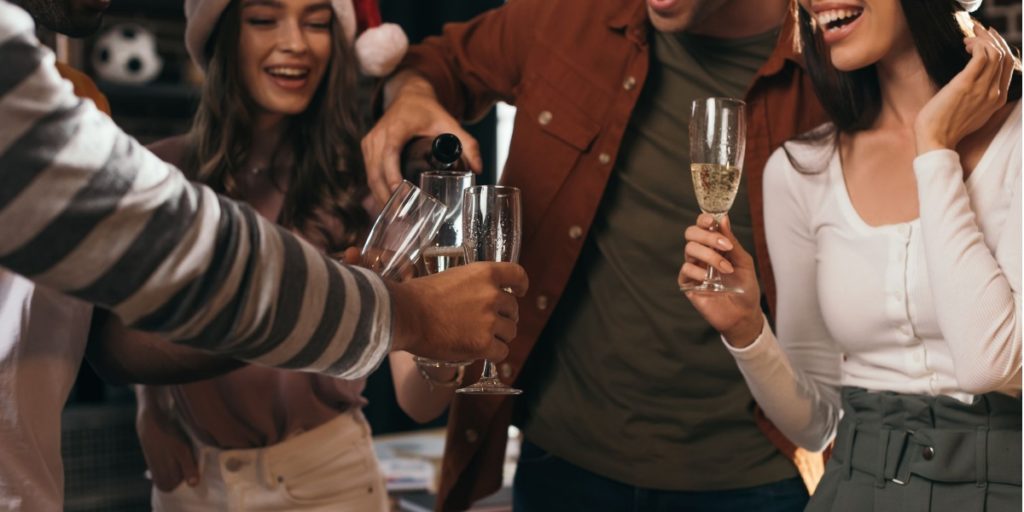 Colleagues at their Christmas Party drinking responsibly as part of great Party etiquette