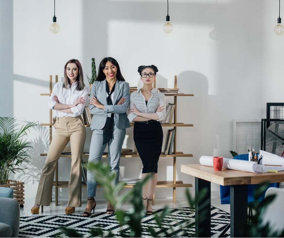 Female trio displaying positive attitudes