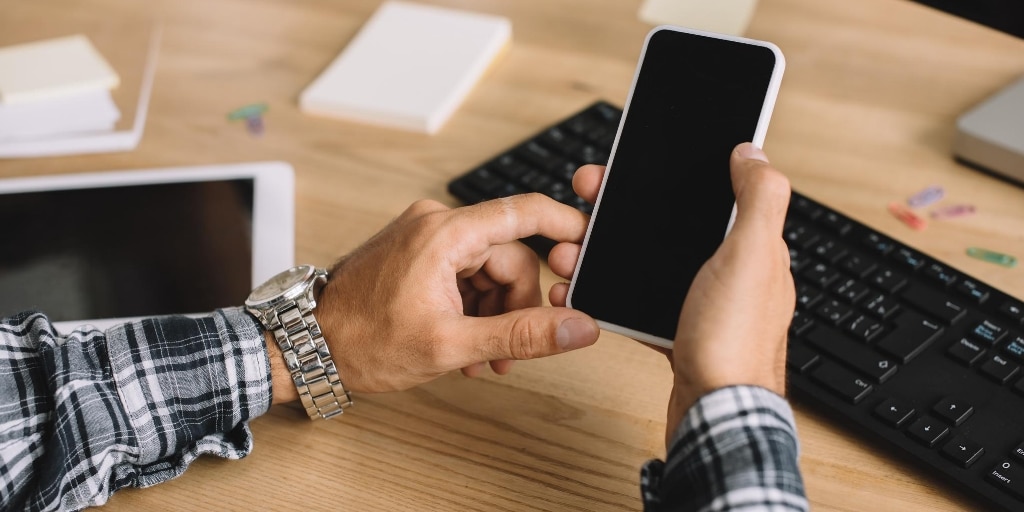 Man using technology to assist his job hunting in times of crisis