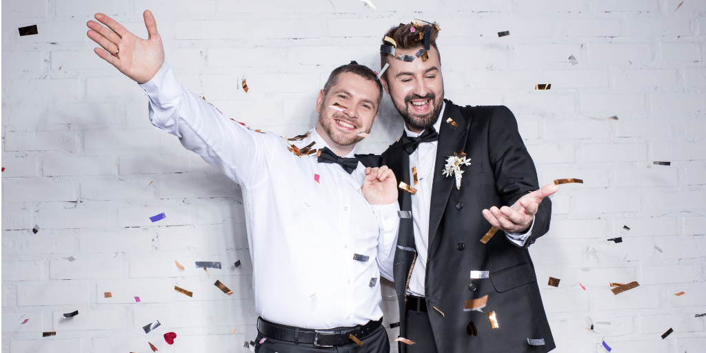 Two young men celebrating the success of a party which added valuable experience to their CV