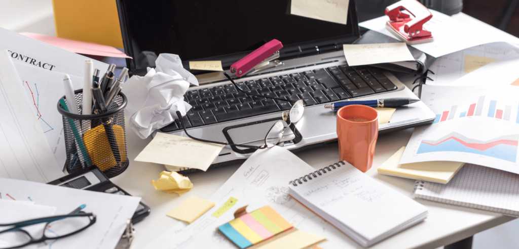 Cluttered desk which nobody needs to see in a video job interview