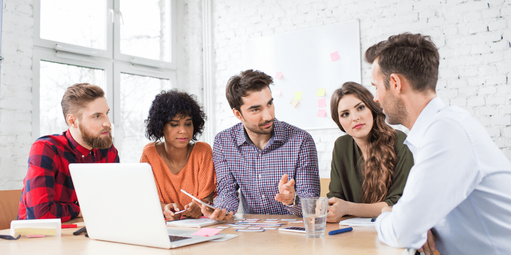 A creative agency team working on a mobile app