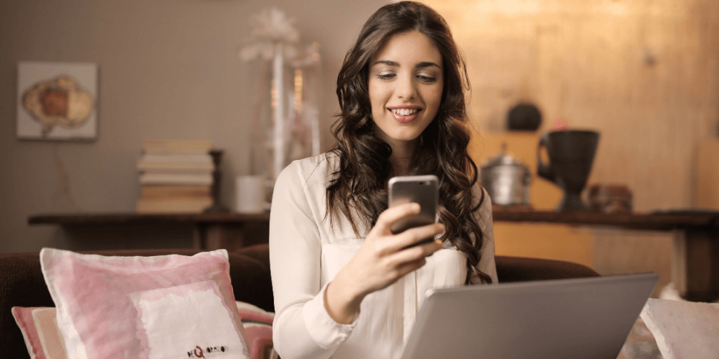 Young lady practicing video calls with her friends