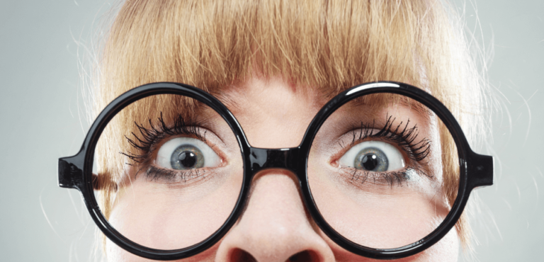 Extreme close up lady looking scared by competency based interview questions