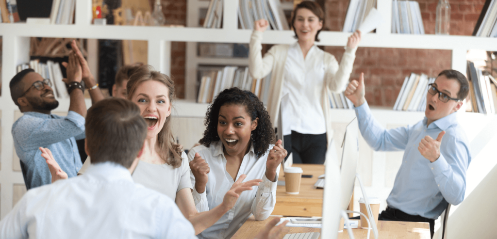 Happy employees celebrating success