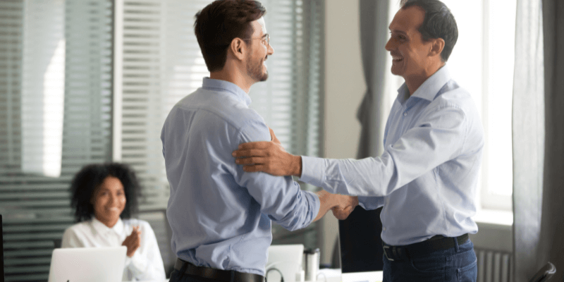 Employer welcoming a permanent employee to the business