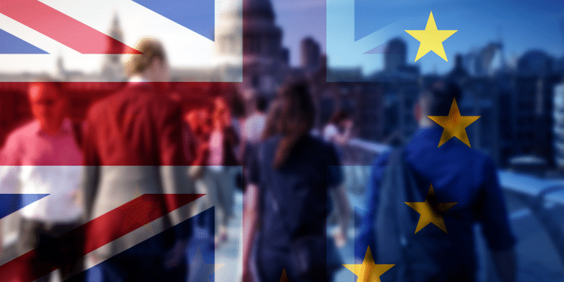 London commuters seen through the British and European flags