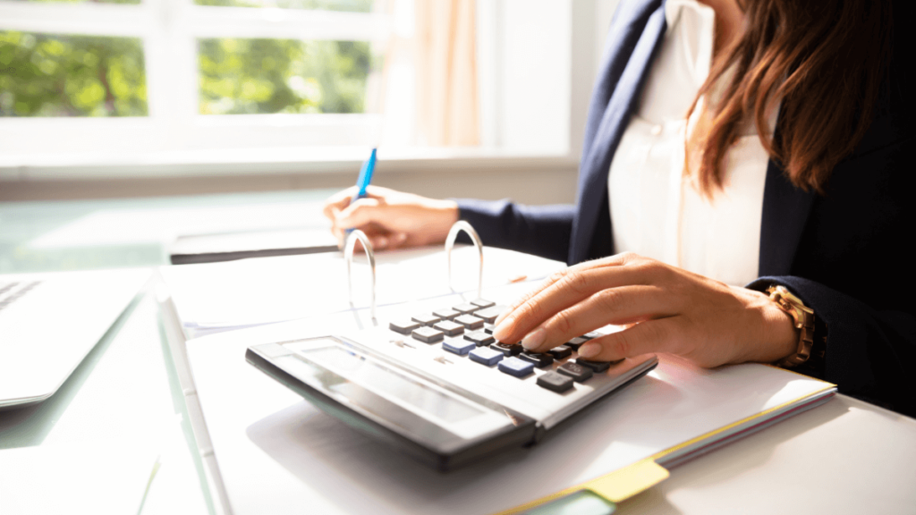 Lady working out if the advertised salary makes the job worth applying for