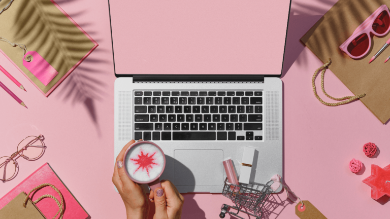 Young lady searches for technology vs beauty careers online, her laptop is surrounded by beauty products