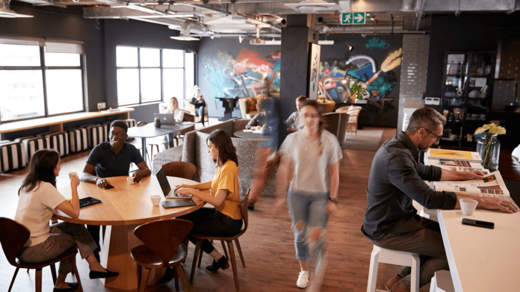 Workers socialise in their workplace canteen